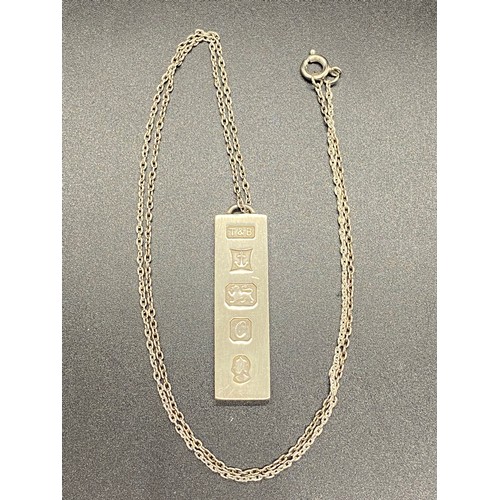 29 - Silver ingot and chain.
18.44g