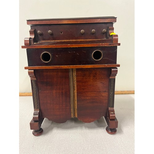 3 - A late 19th century novelty musical smokers cabinet in the form of a harmonium