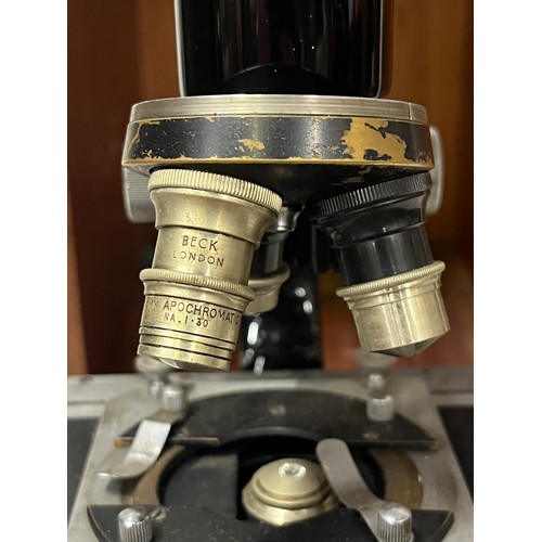 25 - Vintage Beck London microscope with wooden case and 5 lenses and lens holders.