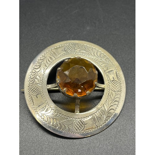 40 - Large scottish silver plated brooch with citrine along with one other brooch 2.3 inches