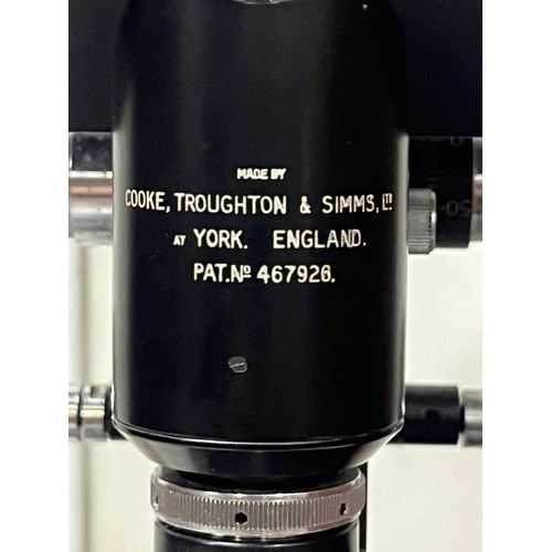 32 - Vintage Cooke Troughton and Simms microscope in wooden case, lenses and polariser.