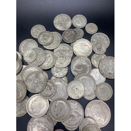 39 - Large collection of silver coins to include shillings, half crowns and Florins etc pre 1947. 495g