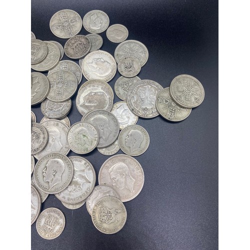 39 - Large collection of silver coins to include shillings, half crowns and Florins etc pre 1947. 495g