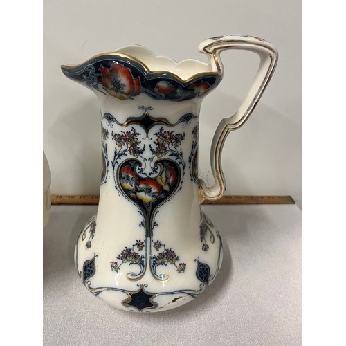 102 - Large art nouveau cromer ware jug along with one other tallest 13