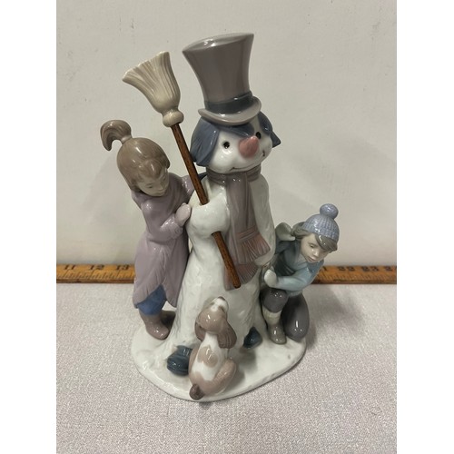 4 - Retired lladro the snowan figure group