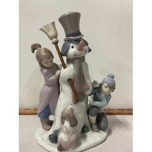 4 - Retired lladro the snowan figure group