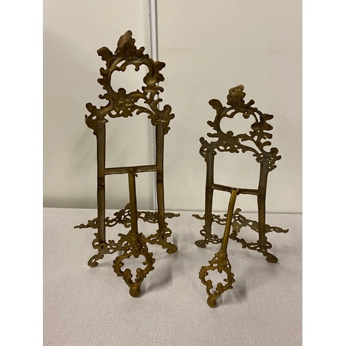 7 - 2 ornate Antique brass display easel's. 
Tallest 20