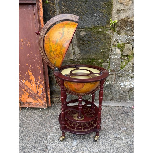 16 - Vintage Globe shaped drinks cabinet.