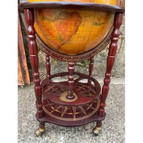 16 - Vintage Globe shaped drinks cabinet.