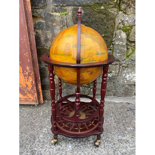 16 - Vintage Globe shaped drinks cabinet.