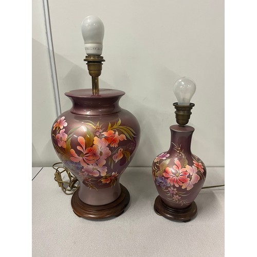 100 - A pair of wood & ceramic floral table lamps signed by L. Drummond made in France. Tallest 18