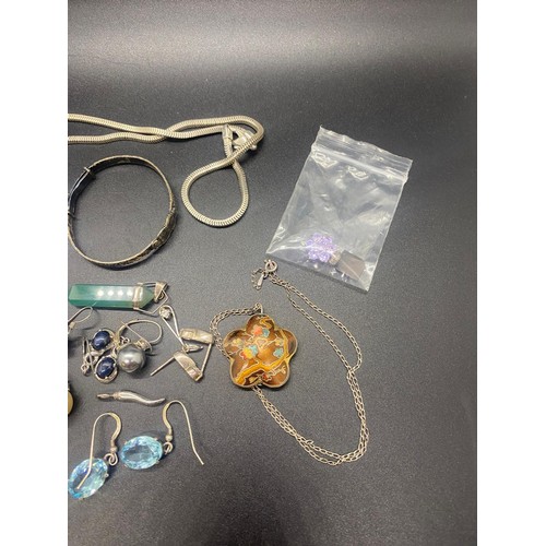 75 - Selection of silver jewellery to include earrings, pendants, necklaces and baby bangle.