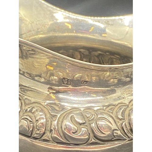 78 - Collection of antique silver items to include 3 legged milk jug and napkin rings etc. 209g