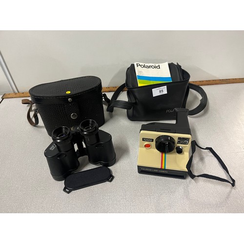 85 - vintage polaroid camera along with Russian binoculars