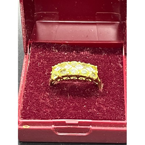 133 - 9ct gold, diamond & emerald ladies ring