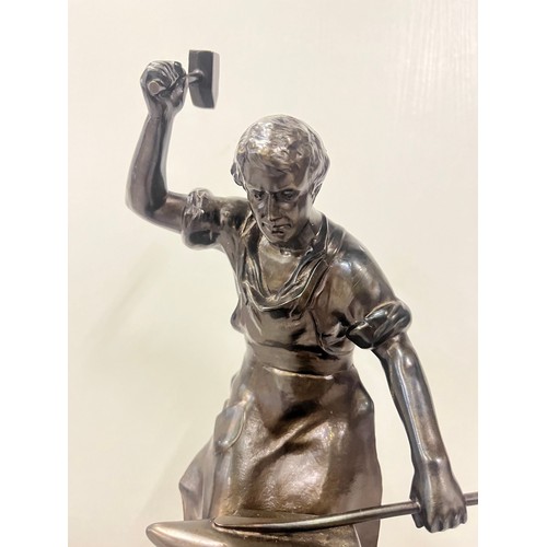 4 - Heavy bronze figure of Blacksmith at his anvil on marble plinth, presented to Sgt A E Brooksby from ... 