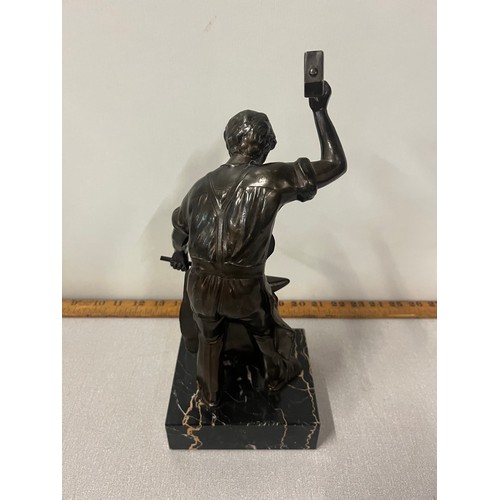 4 - Heavy bronze figure of Blacksmith at his anvil on marble plinth, presented to Sgt A E Brooksby from ... 