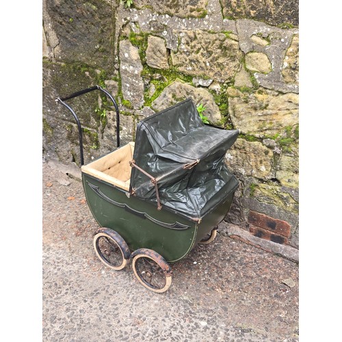 236 - Antique dolls pram.