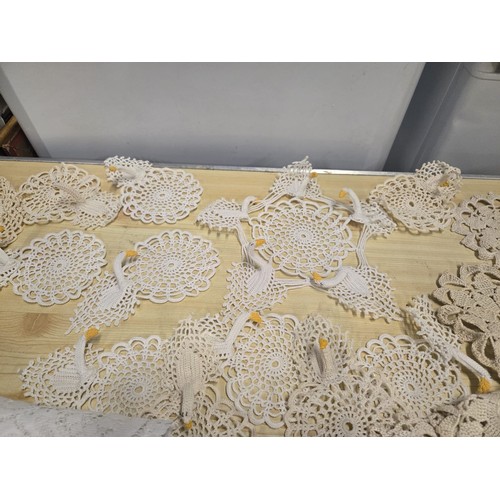 404 - Selection of lace doilies to include Swans along with table covers etc.