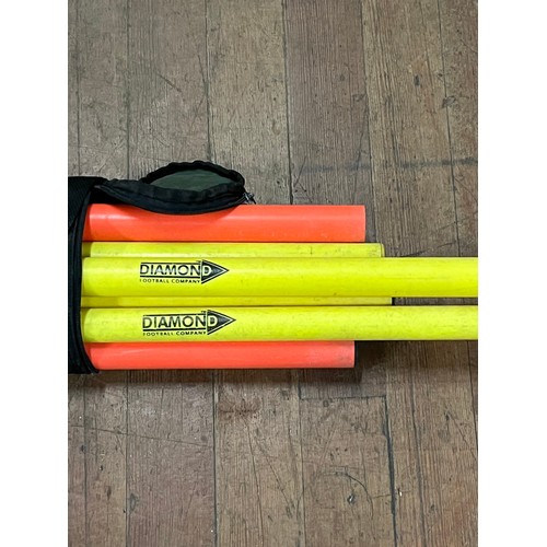 428 - Diamond football company flexi boundary poles.