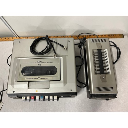 475 - Vintage Akai portable colour VHS player with charger.