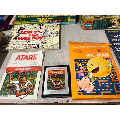 511 - selection books etc  along with 2 atari games