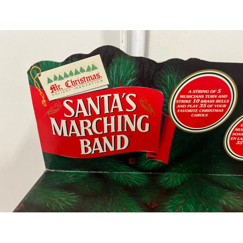 311 - Santa's marching band decoration and boxed snowman ornament.