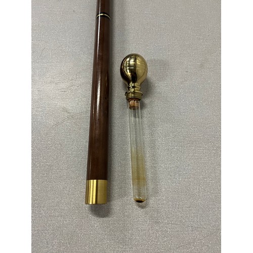 321 - Champion sport cased pool cue along with 3 section walking stick with hidden compass & alcohol tube.