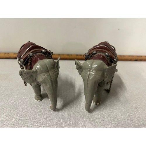 87 - A pair of heavy king cast elephants