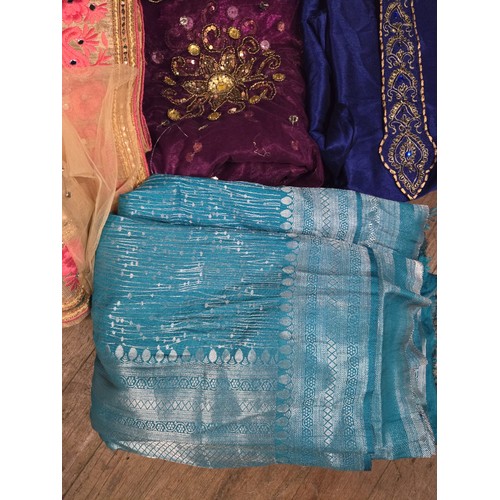 506 - Selection of sari's to include Lakshmi goddess of wealth dress etc