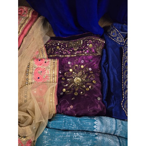 506 - Selection of sari's to include Lakshmi goddess of wealth dress etc