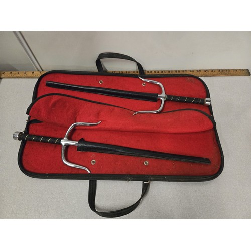 519 - A pair of  Samurai training swords and case