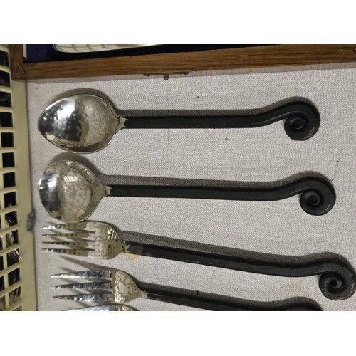 549 - selection of cutlery to include hammered steel set