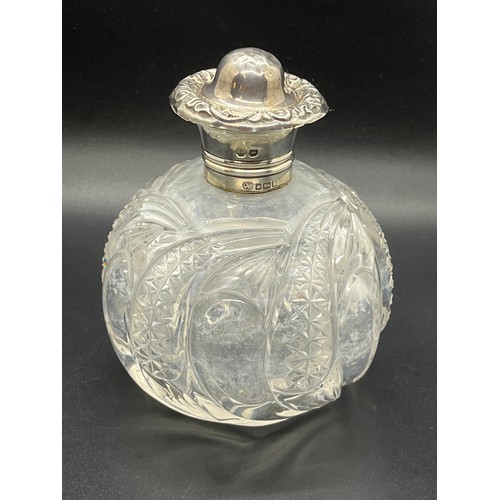 23 - Large silver top perfume bottle with original stopper, 5