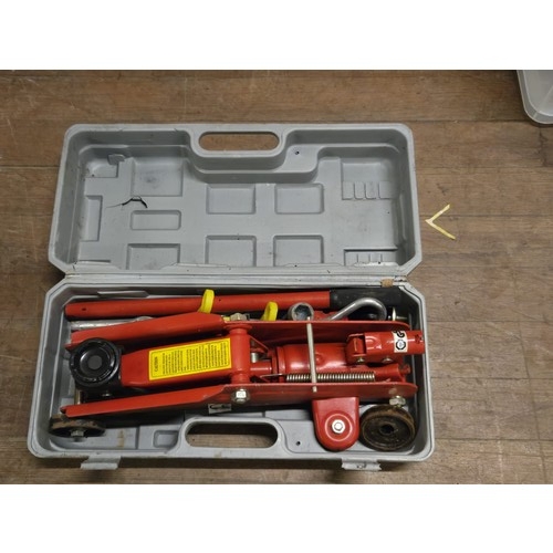 603 - Rolson 2 tonne hydraulic trolley jack, engine load leveller & 12 Fentrim swiss winbag air wedges .