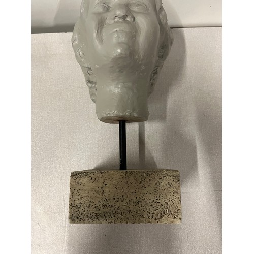 29 - heavy child bust on stone base. 14