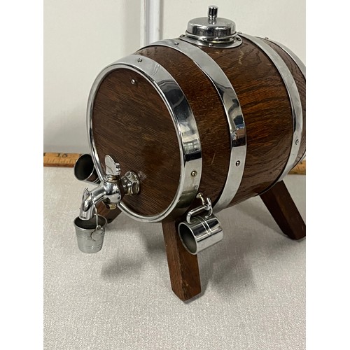 33 - Oak and chrome drinks barrel complete with bucket and cups.