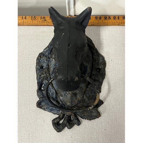 34 - Large metal horse door knocker. 10