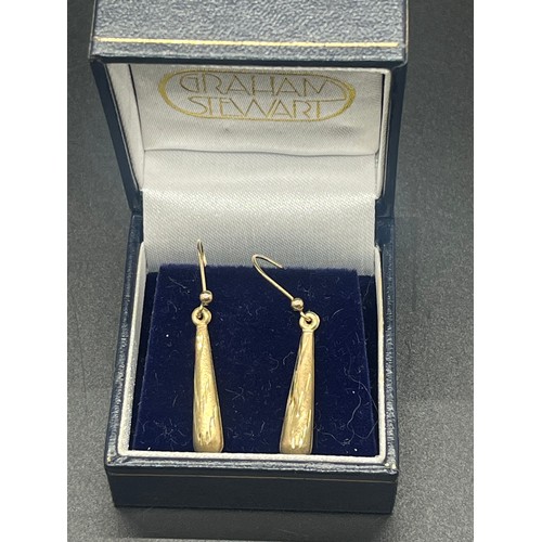 58 - A pair of 9ct gold earings