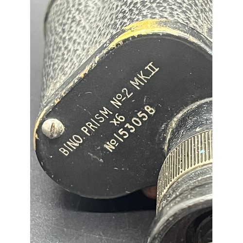 313 - A pair of military binoculars by kershaw stamped 1942