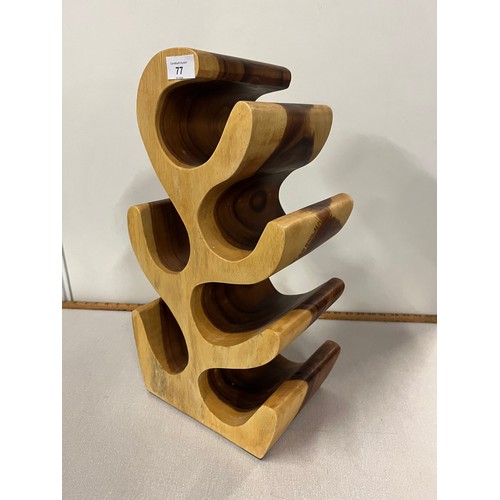 77 - Solid wood leaf shape wine rack, holds 6 bottles. 20