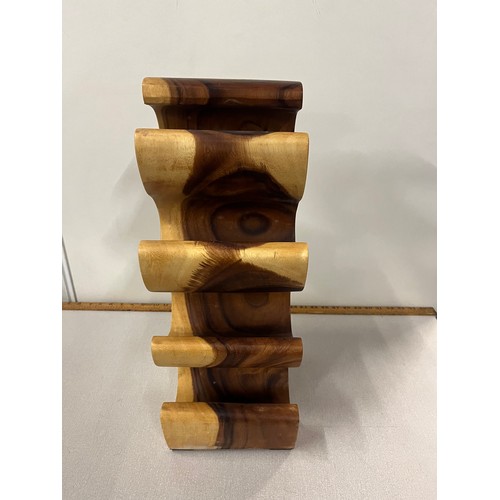 77 - Solid wood leaf shape wine rack, holds 6 bottles. 20