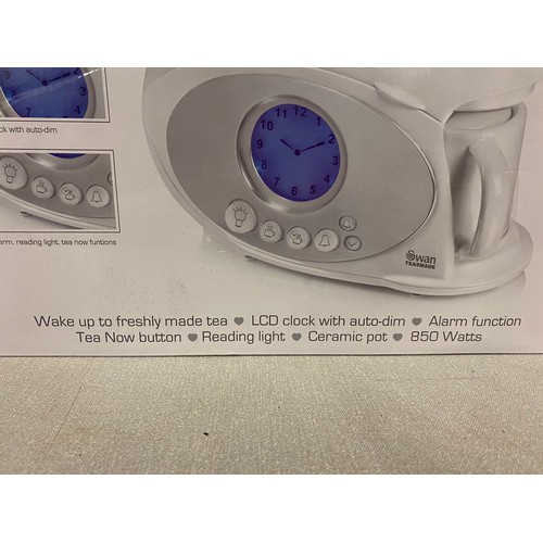 329 - Boxed Swan Teasmade with LCD clock and alarm function.