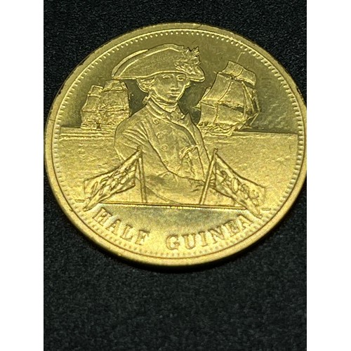 2 - 22ct gold Tristan da cunha Trafalgar half guinea in presentation box, 4.2grams