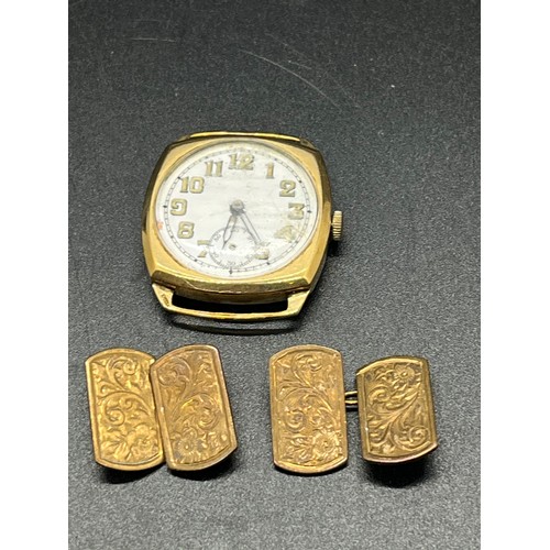 220 - 9ct gold watch face (working, no 2nd hand) along with pair of gold fronted cufflinks.