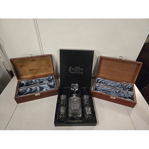 492 - Boxed Rennie Mackintosh Glencairn crystal decanter & 4 glasses along with 2 wooden bottle holders.