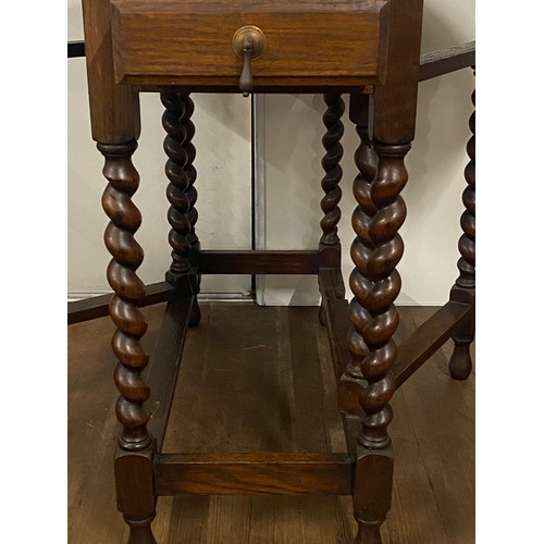 83 - Antique oak barley twist gateleg drop leaf table with 2 drawers.