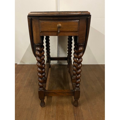 83 - Antique oak barley twist gateleg drop leaf table with 2 drawers.