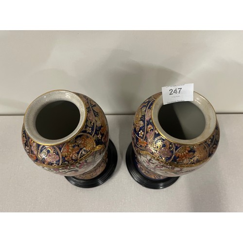 247 - A pair of ceramic Japanese vases, 8.5