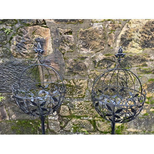 372 - Pair of free standing metal flower baskets 60